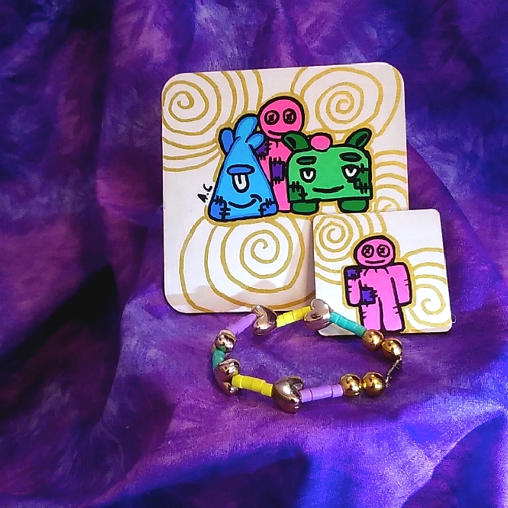 I'm selling two mini paintings with a free bracelet